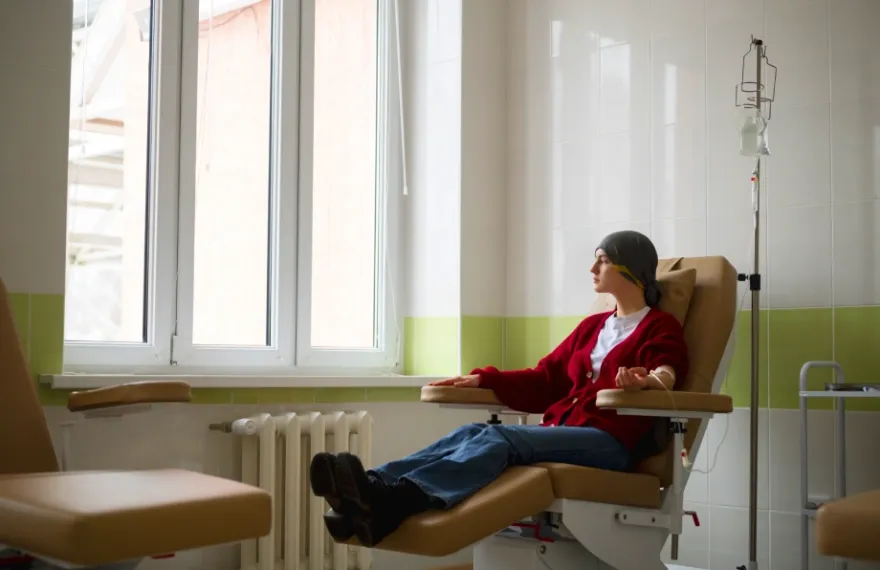 Patient resting in a hospital recliner